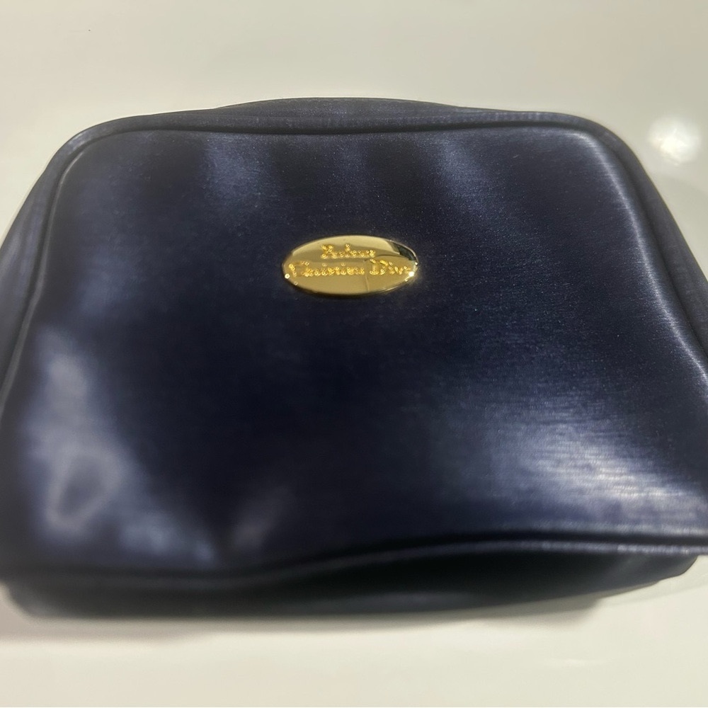 Christian Dior Perfume ., Women's travel toiletry bag, purple with gold plaque.